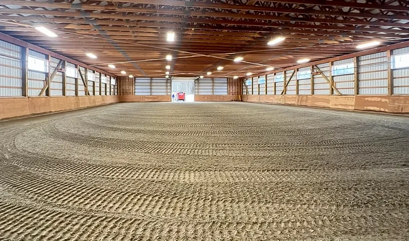 Indoor dust-free footing post-frame arena